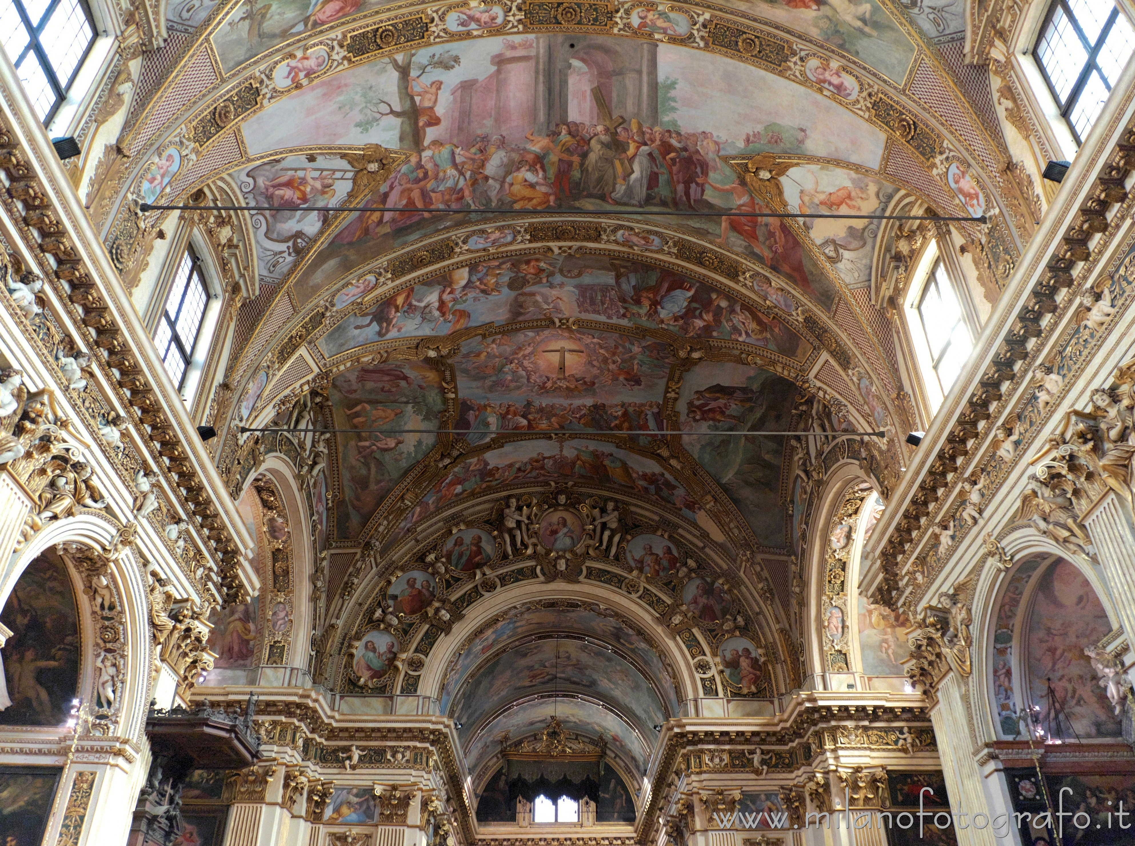 Milan (Italy) - Vault and triumphal arch decorated with stuccos and frescoes in the Church of Sant'Antonio Abate